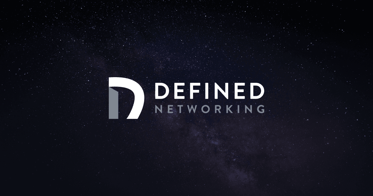 The Defined Networking wordmark over a deep space nebula.